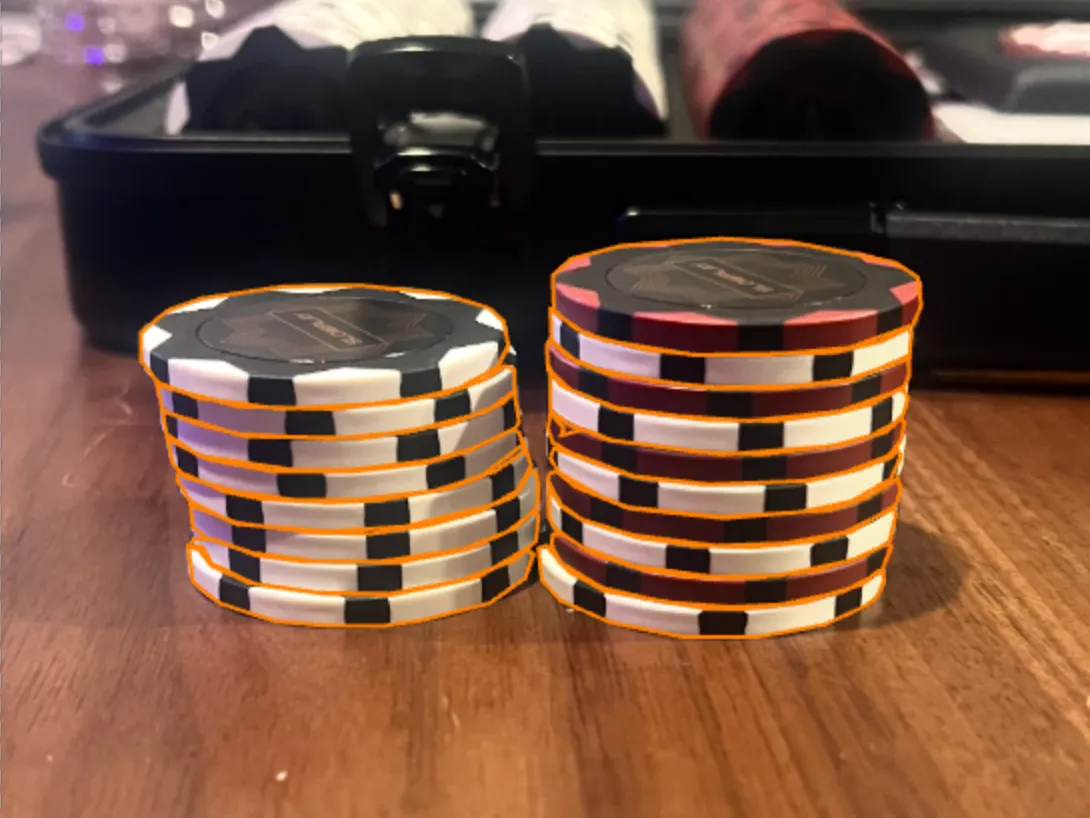 Segmentation output, with a separate mask outlining each poker chip in two stacks